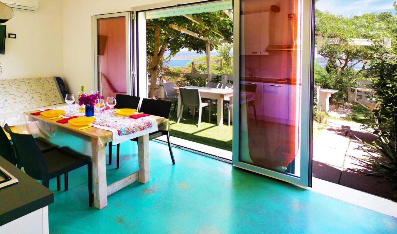 Panohome Porto Pino Exterior foto