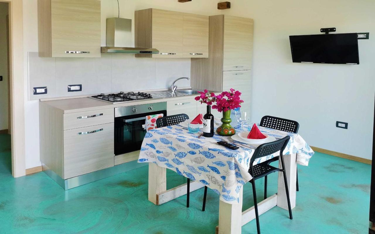 Panohome Porto Pino Exterior foto